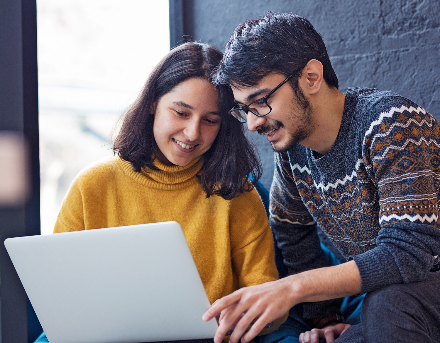 Diverse team of professionals collaborating on innovative technology projects at POSSPOLE CATALYST